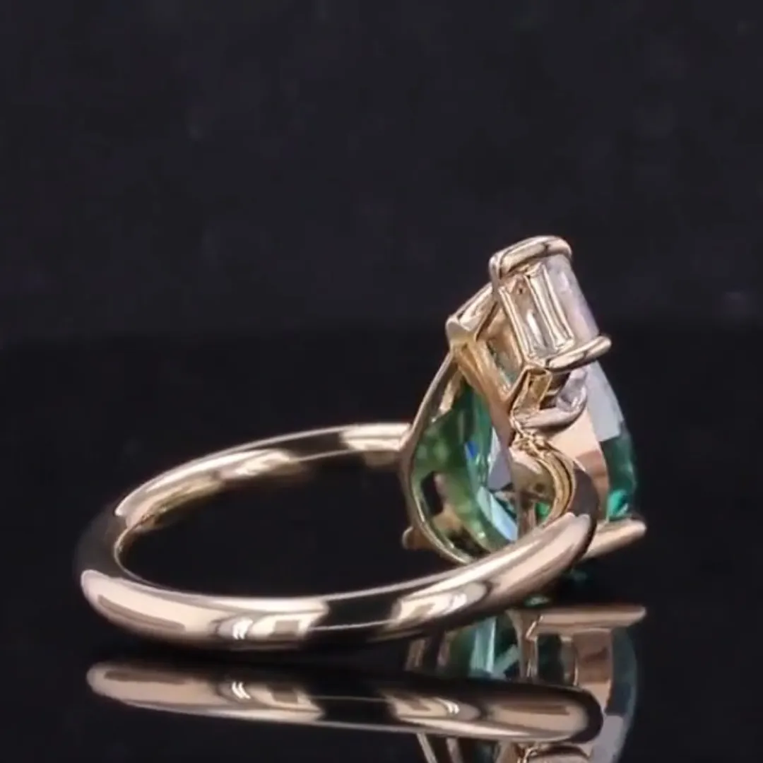 /public/photos/live/Green Pear & Hexagon Cut Toi Et Moi Engagement Ring 489 (1).webp